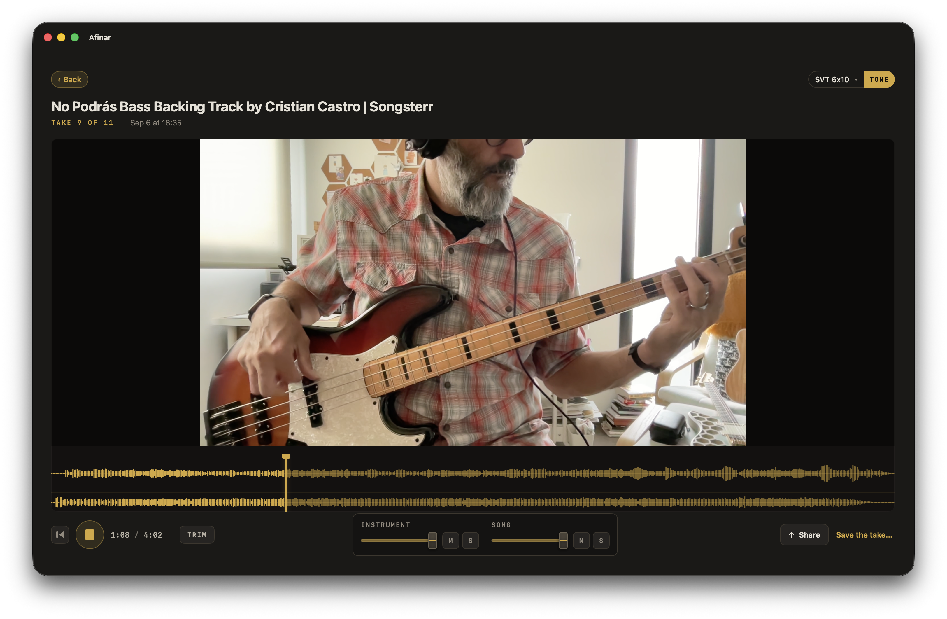 A video take of a bassist playing, with waveforms and separate instrument and song levels in Afinar.